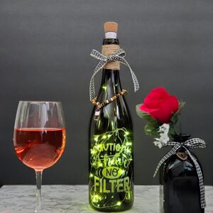 laser etched upcycled bottle; caution, i have no filter