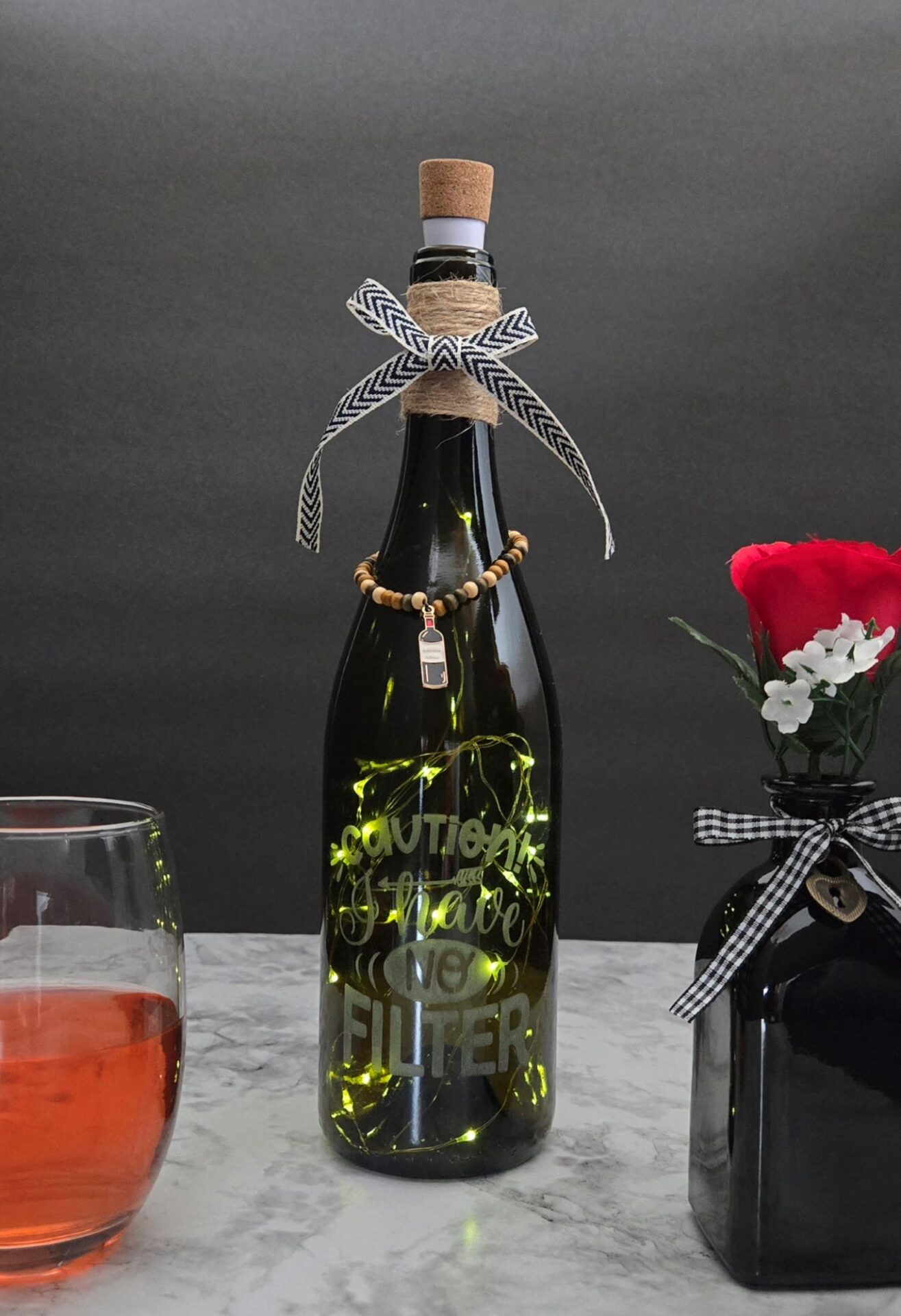 laser etched upcycled bottle; caution, i have no filter