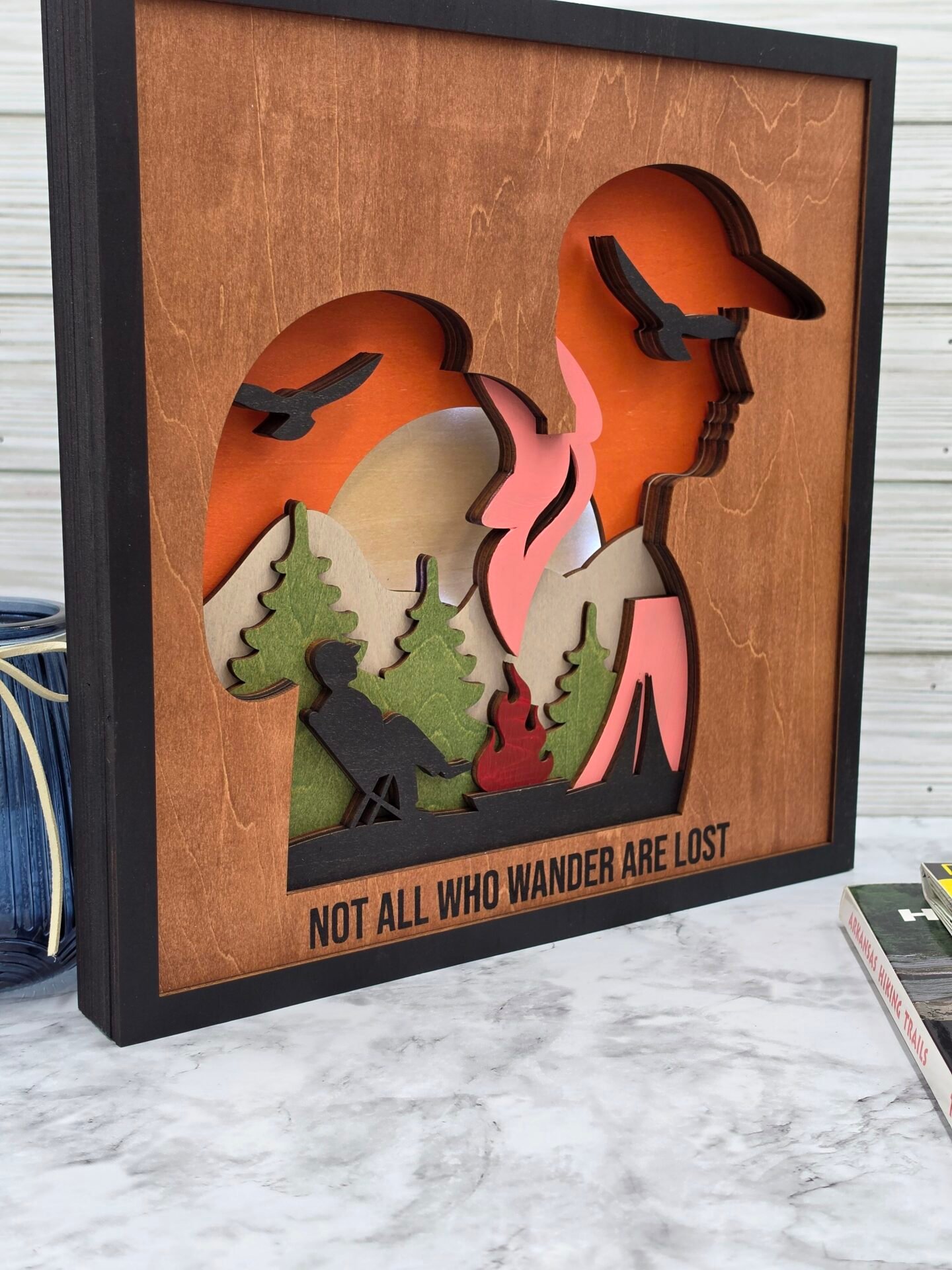 campfire and hiker side 12 in
